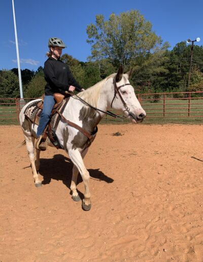 Cassidy enjoying a lesson on Gypsy